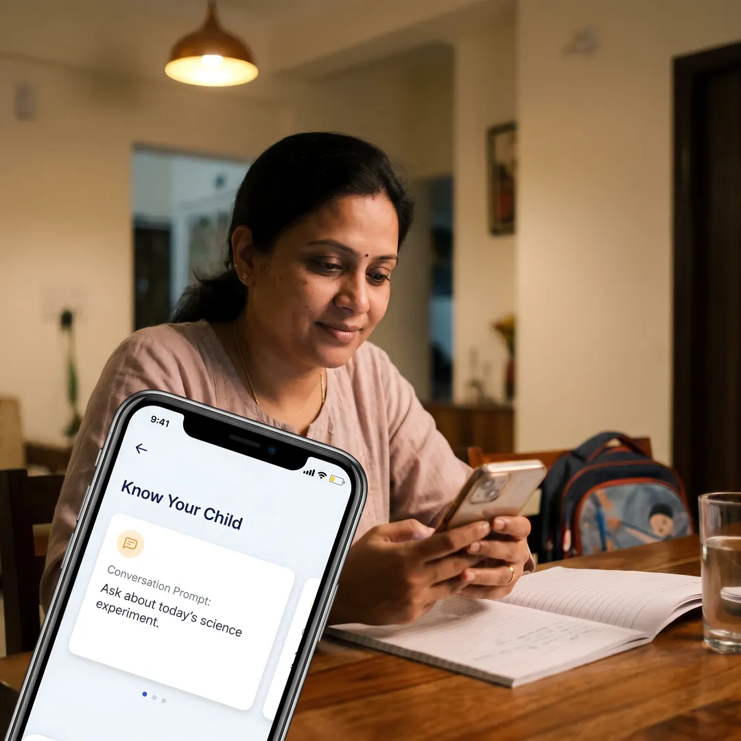 Parent reviewing the Coschool SchoolAi Parent App with daily learning insights