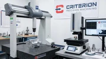 Precision machine shop CMM inspection system measuring tight-tolerance machined components