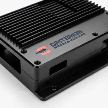 Precision machined FPGA prototype components including aluminum housing and heat sink