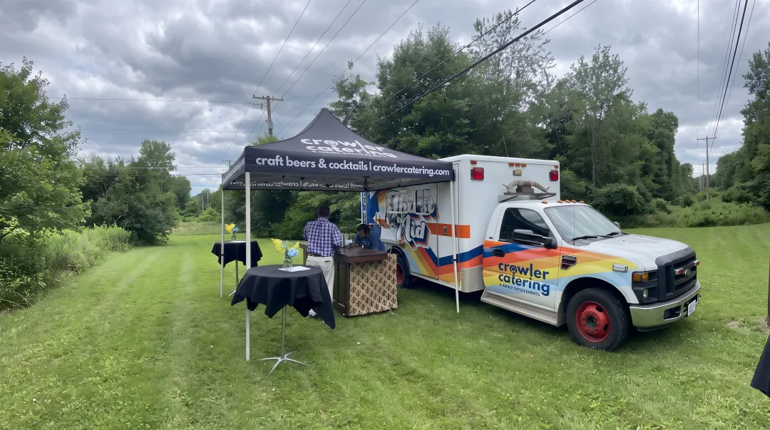 Crowler Catering Thirst Aid ambulance mobile bar serving signature cocktails at Louisville wedding reception