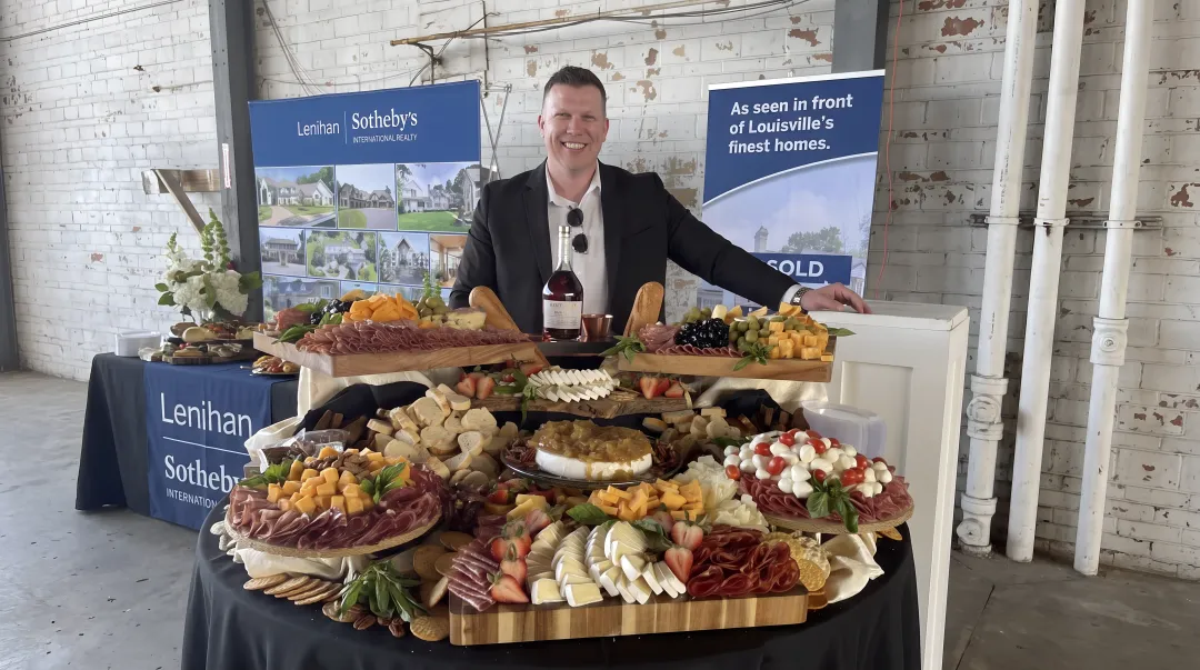 Cold appetizer spread featuring charcuterie board bruschetta and seafood displays with garnishes