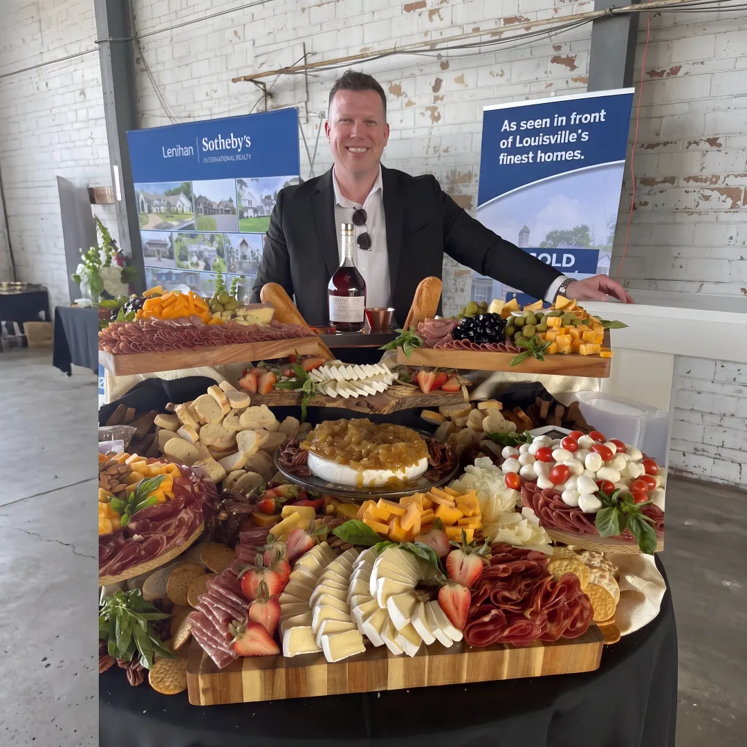 Catered corporate event buffet with mobile bar