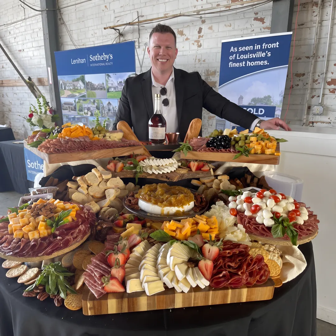Caterer arranging a charcuterie grazing display