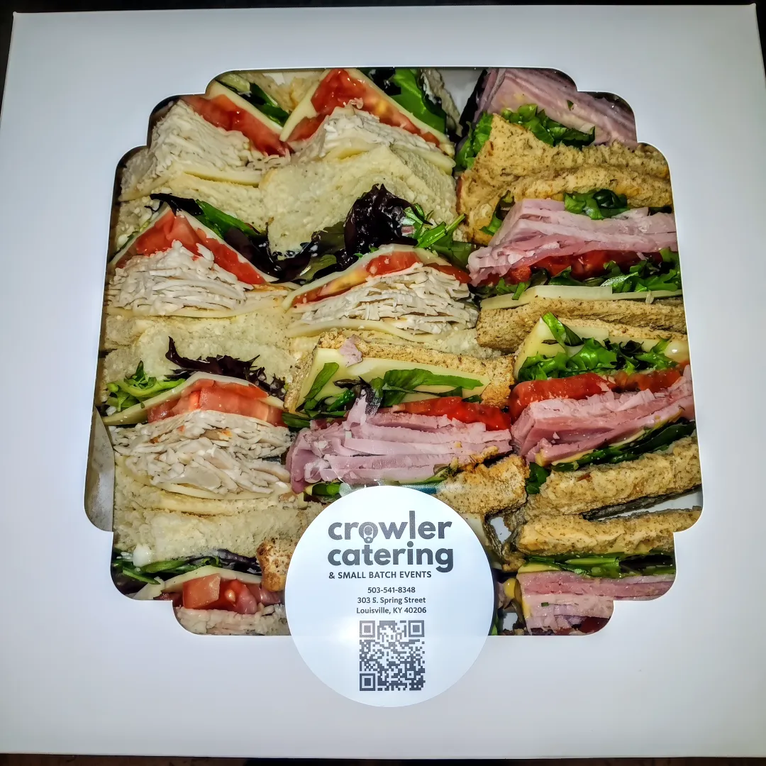 Breakfast sandwiches and pastries ready for catering