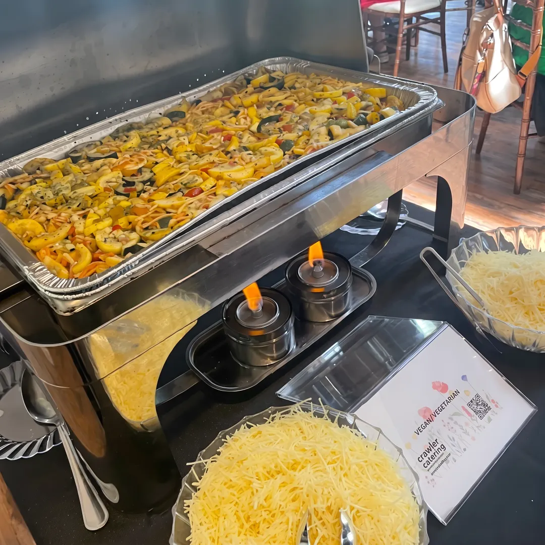 Guests choosing food from catered buffet