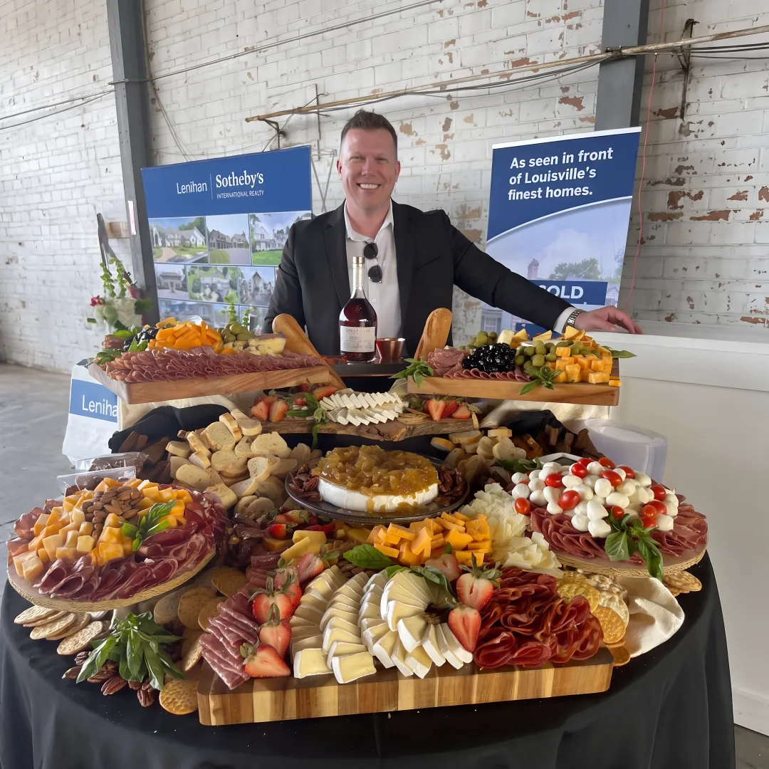 Coworkers enjoying catered food and drinks