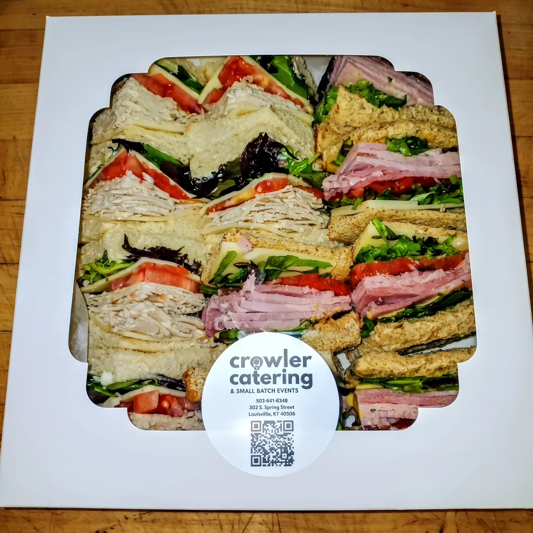 Breakfast sandwiches and pastries for a group meeting