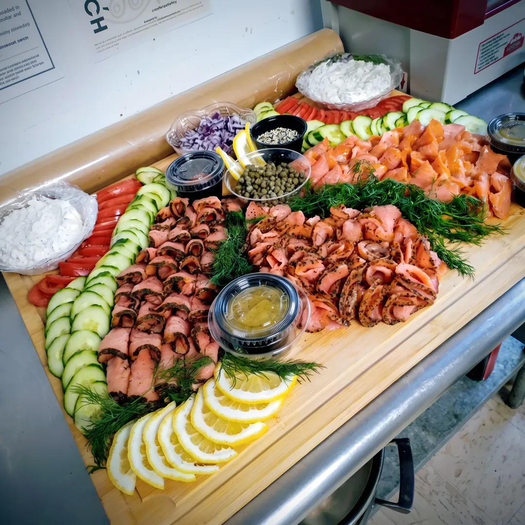 Holiday catering team arranging buffet