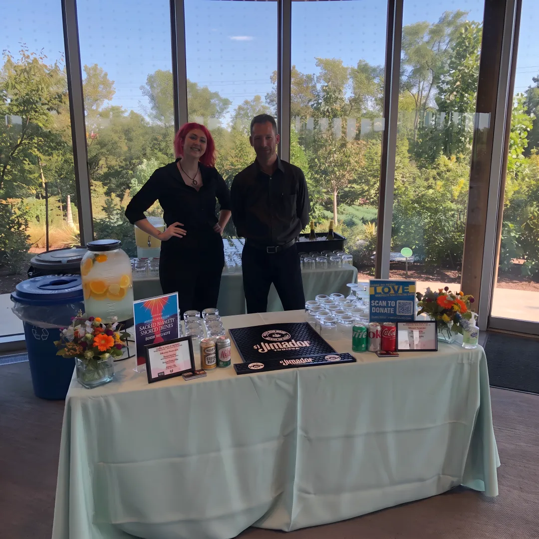 Guests enjoying catered food and drinks at an event