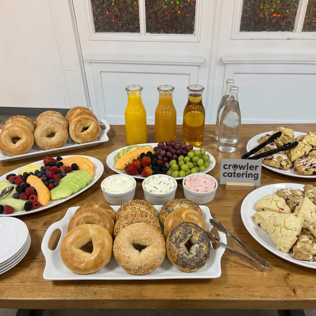 Catered bagel breakfast with fresh sides