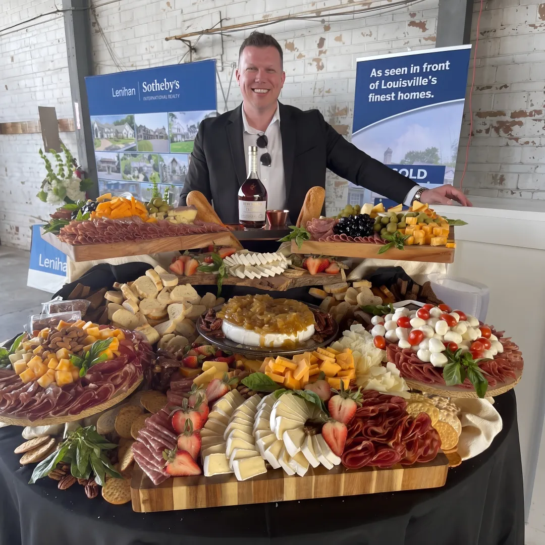 Caterer arranging a private event food display