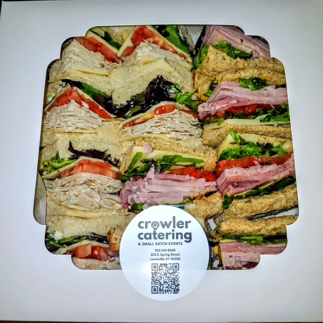 Individually packaged sandwiches and salads for a catered lunch