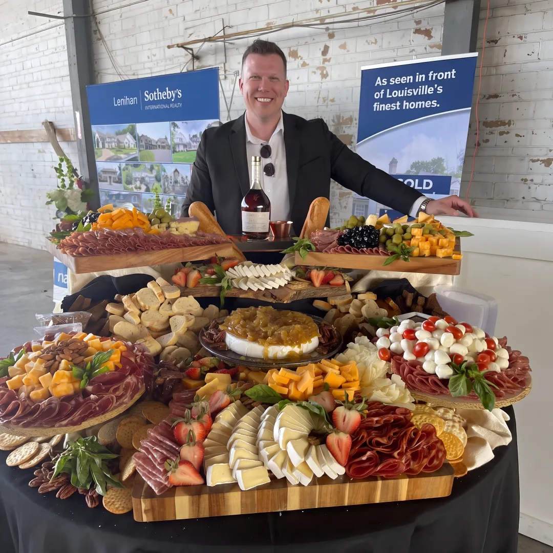 Caterer arranging food and cocktails for an event