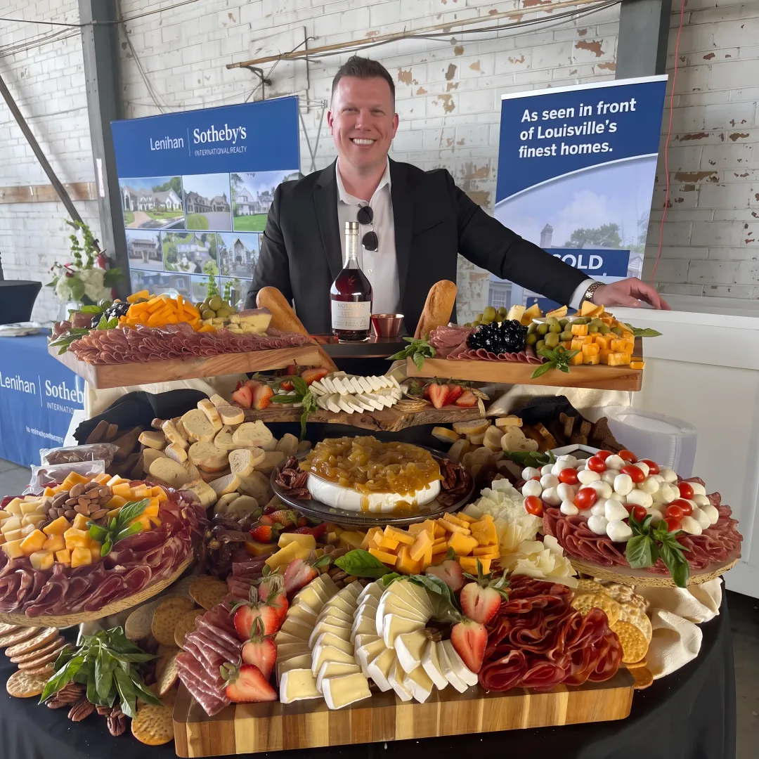 Caterer arranging food and drink service
