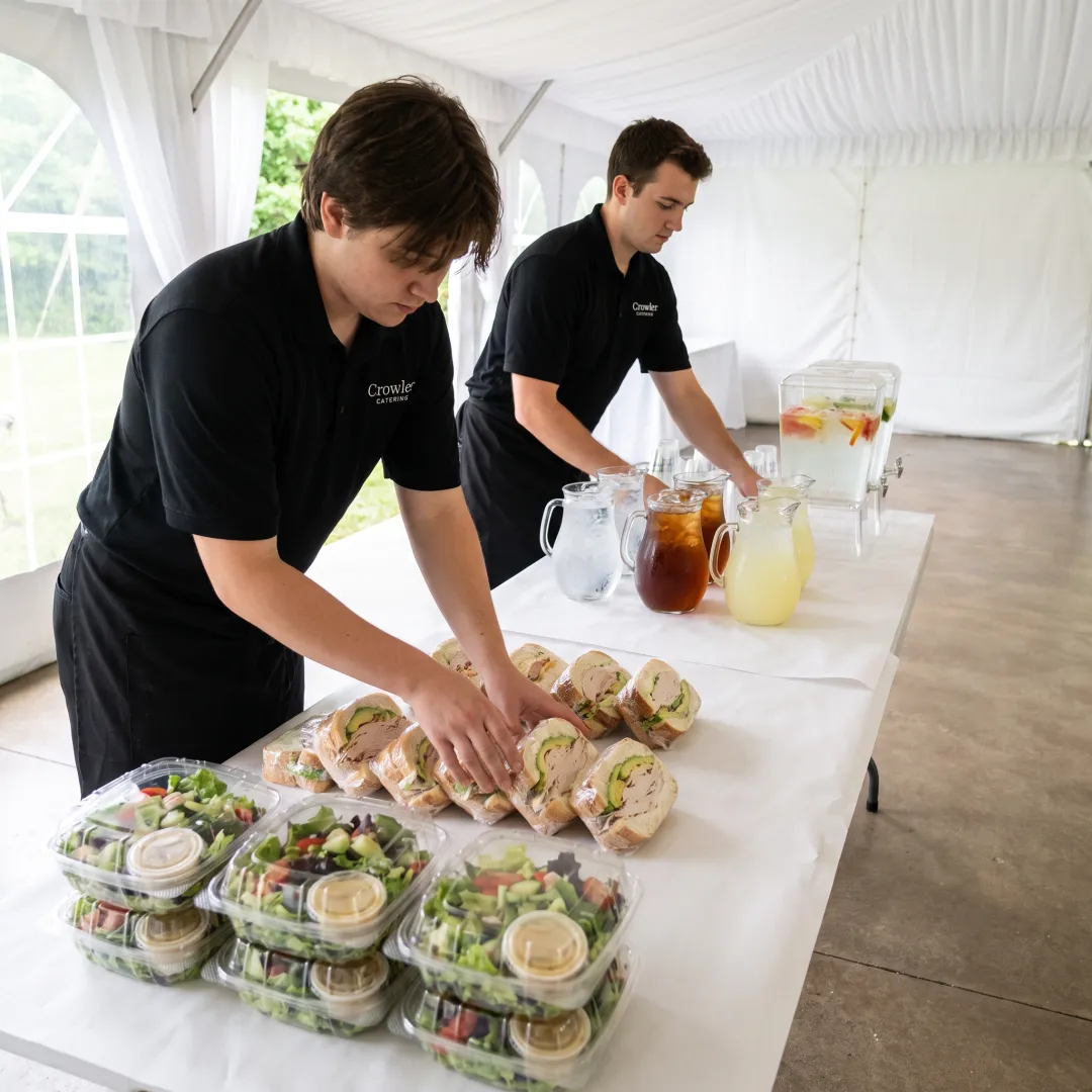 Catering team arranging food for a Louisville event