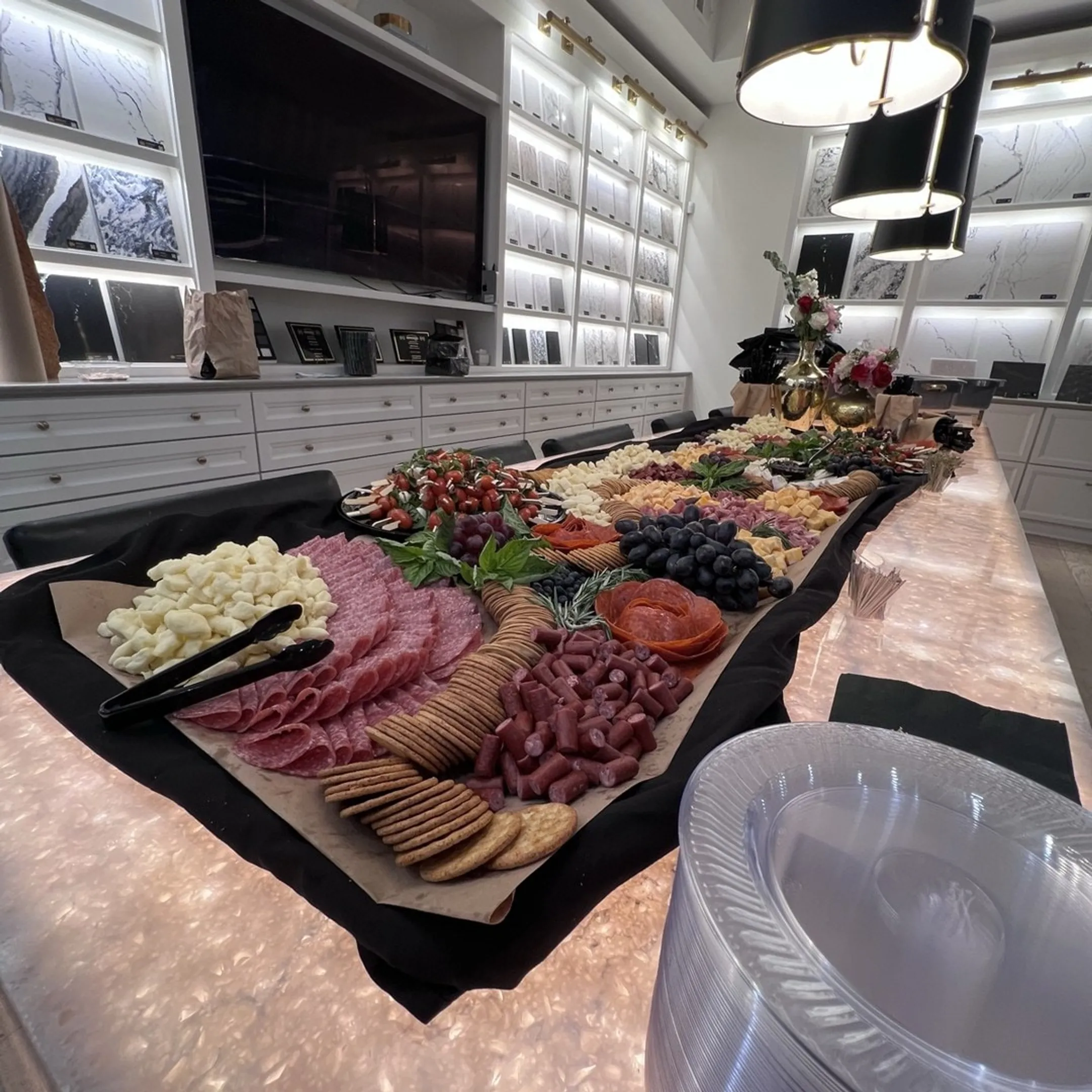 Caterer arranging a private event food display