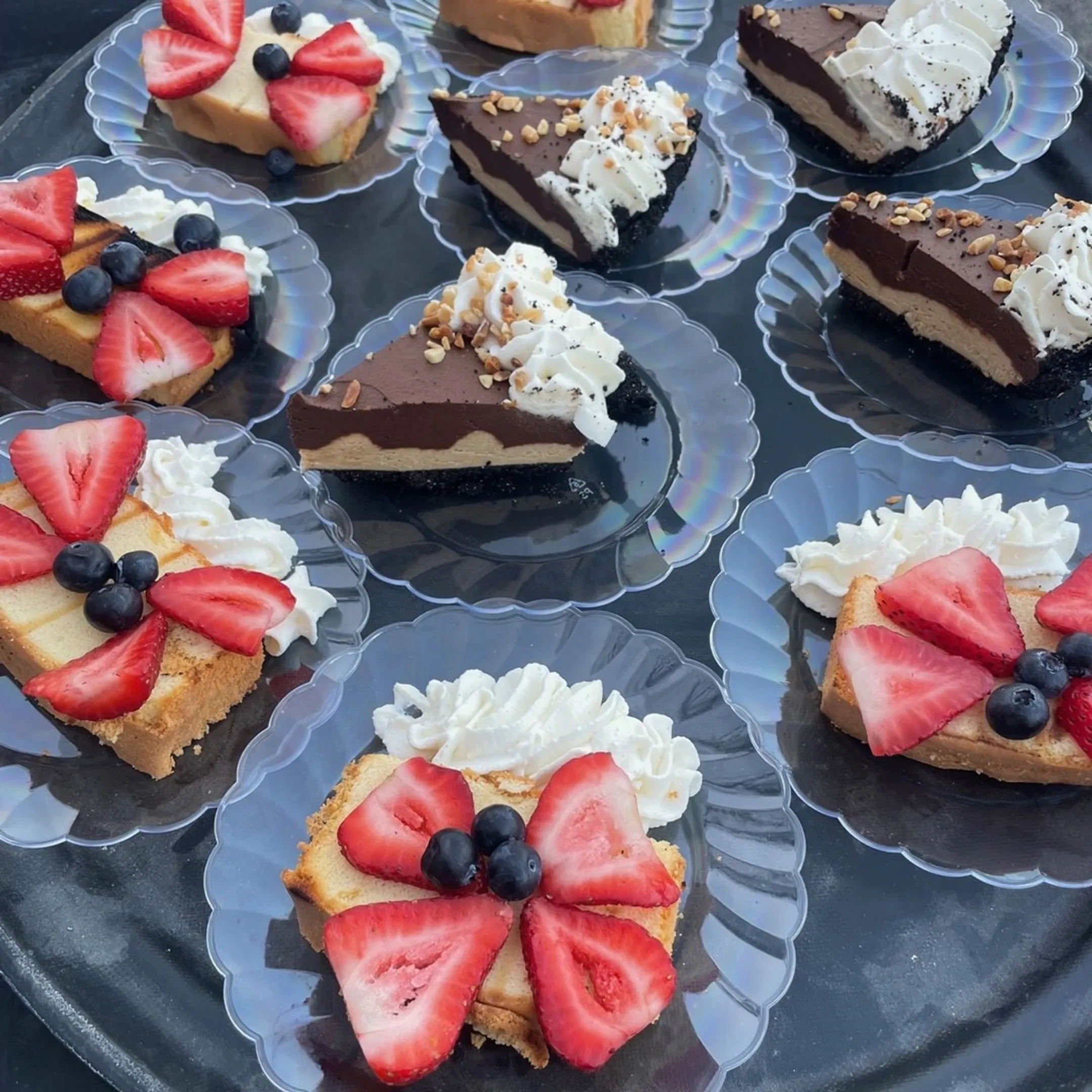 Guests enjoying catered food and cocktails at an event