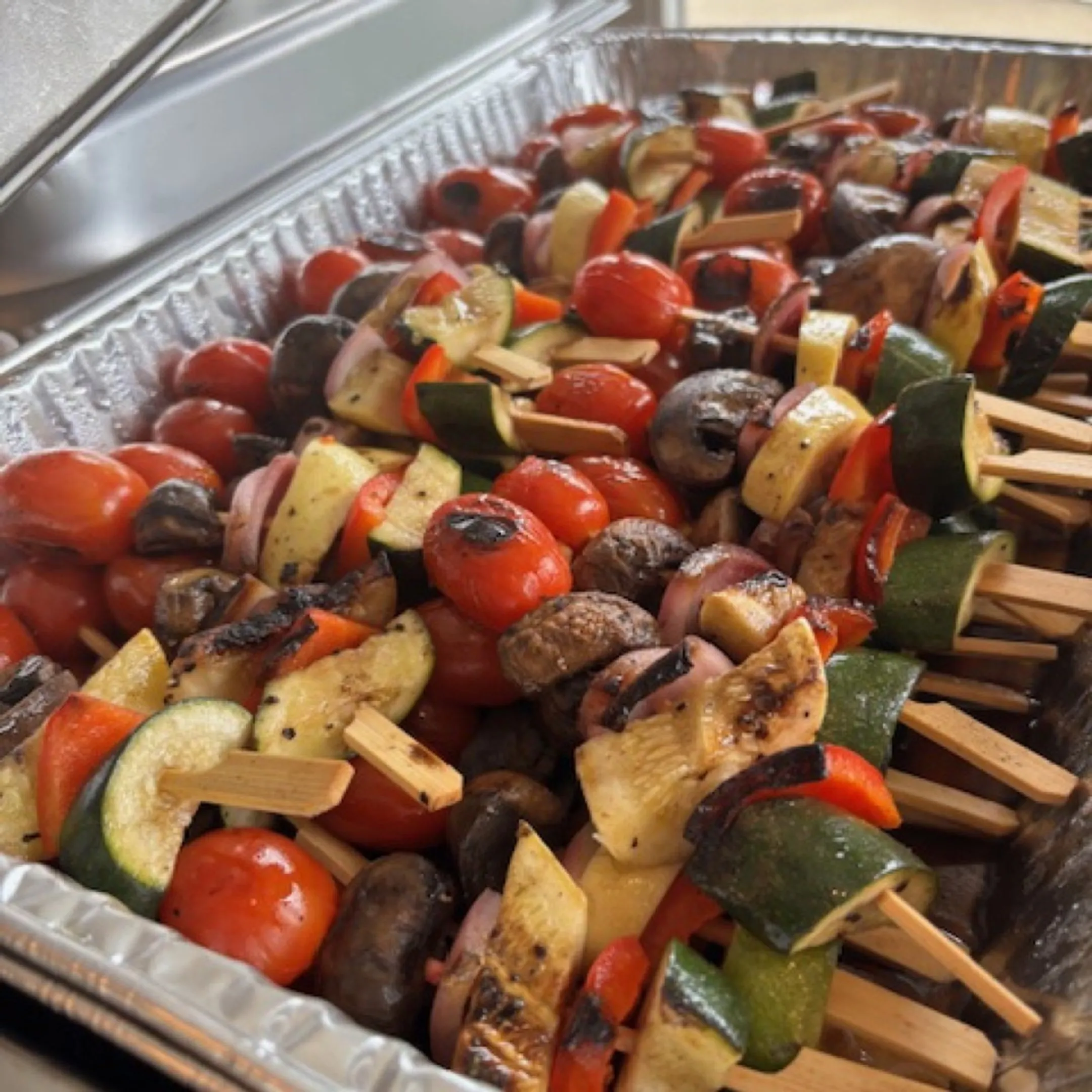 Catering team arranging food for a Louisville event