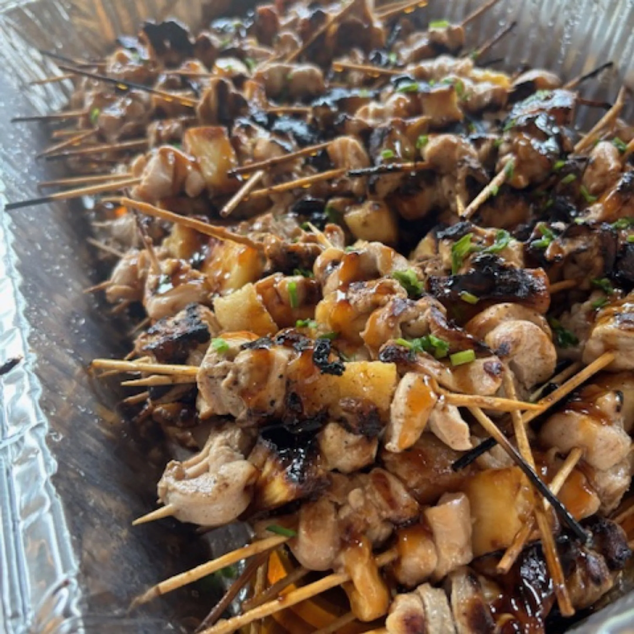 Caterer arranging a wedding grazing table
