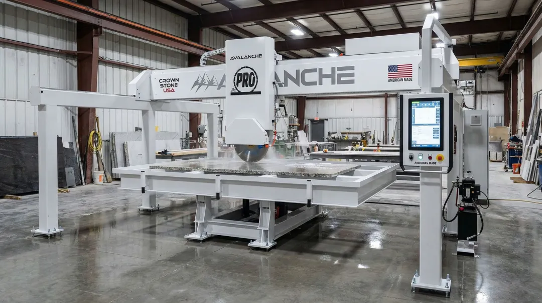 Crown Stone USA Avalanche Pro CNC bridge saw with touchscreen controls and hydraulic lift