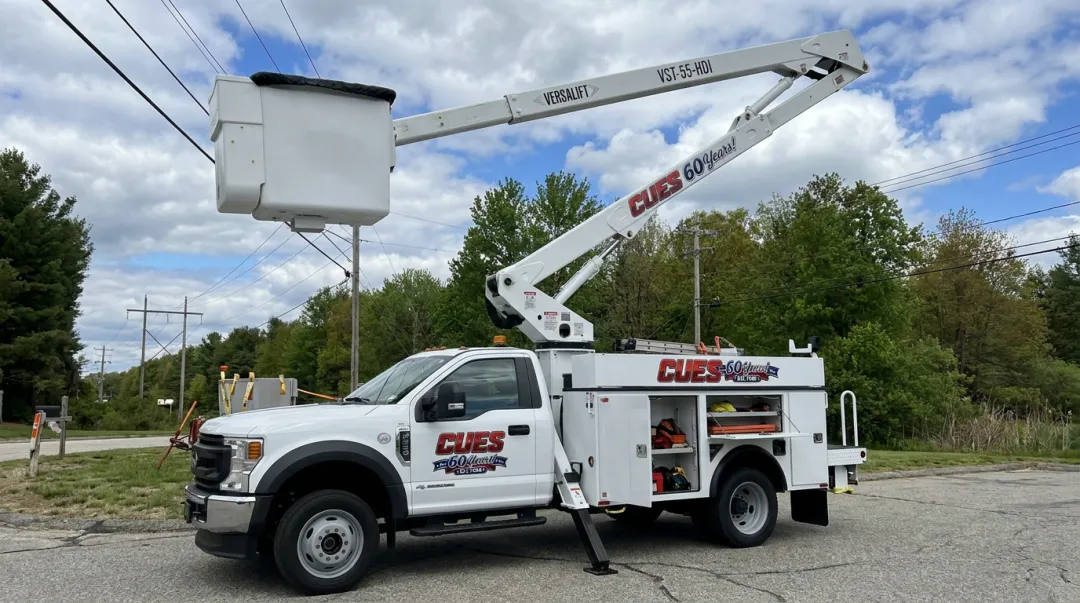 Versalift VST-55-HDI insulated bucket truck with Category C 46kV rating in CUES inventory