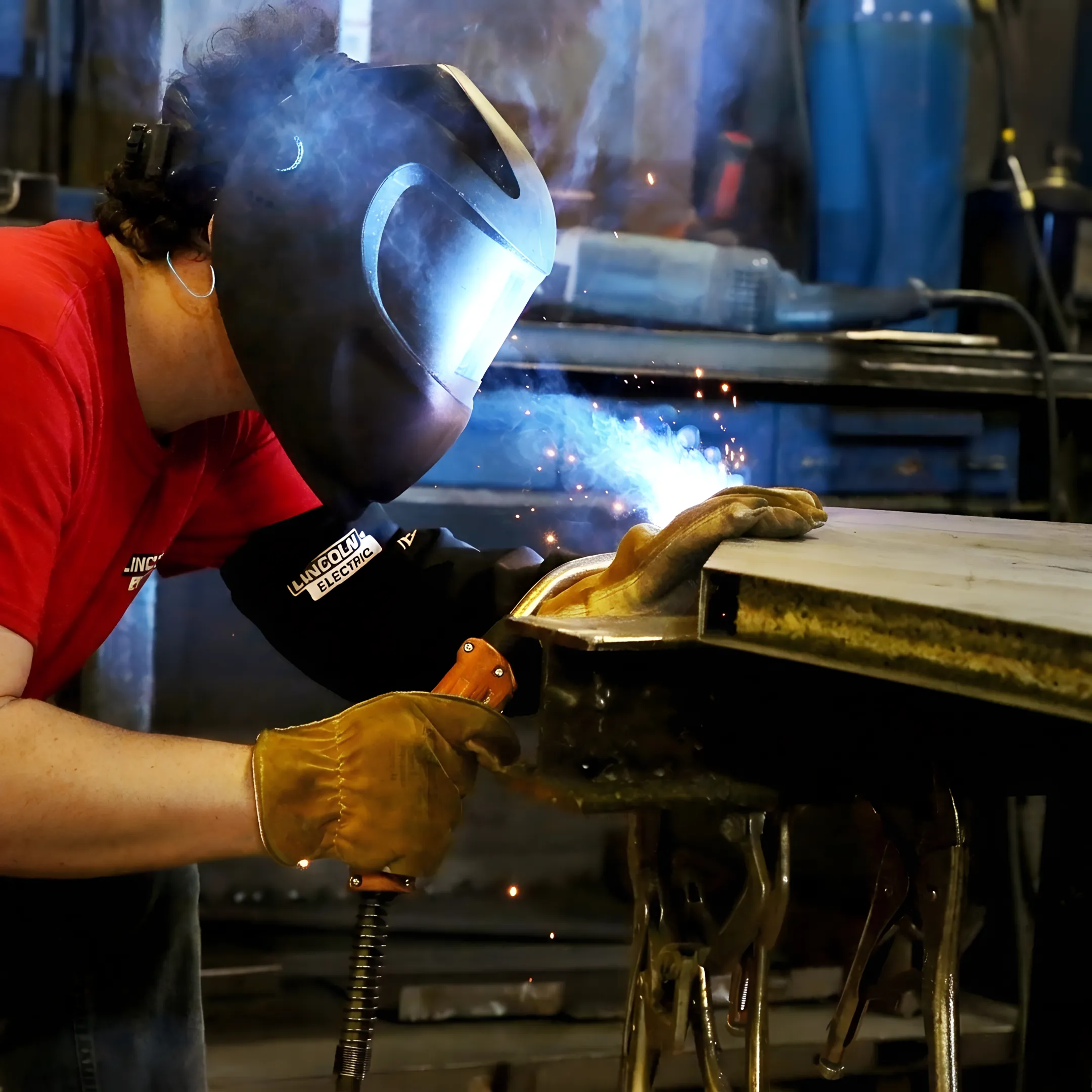 Custom steel commercial doors and frames being inspected in a manufacturing facility
