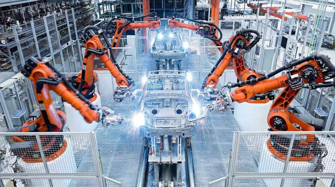 Automotive laser welding robotic cell assembling vehicle body panels on production line