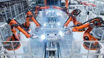 Automotive laser welding robotic cell assembling vehicle body panels on production line