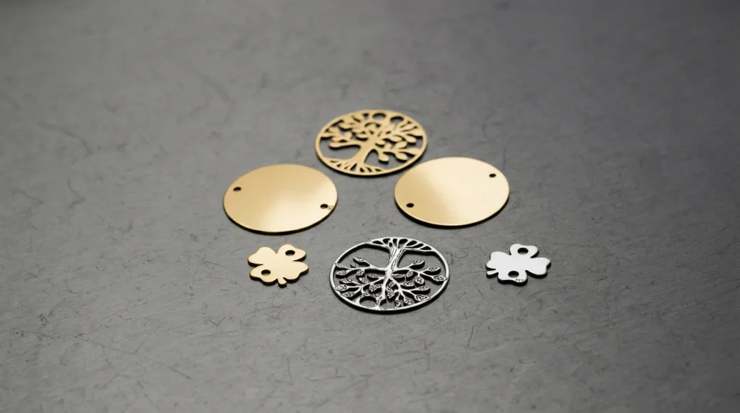 Fiber laser cutting precision jewelry components in gold and silver sheet metal