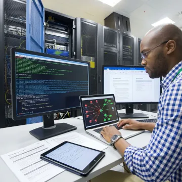 Penetration tester analyzing network vulnerabilities
