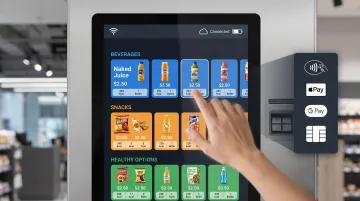 Smart vending machine touchscreen interface displaying products cashless payment options