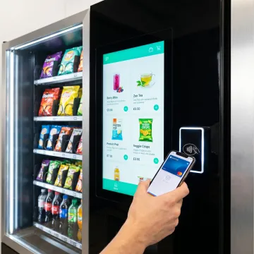 Smart cashless vending machine with touchscreen interface