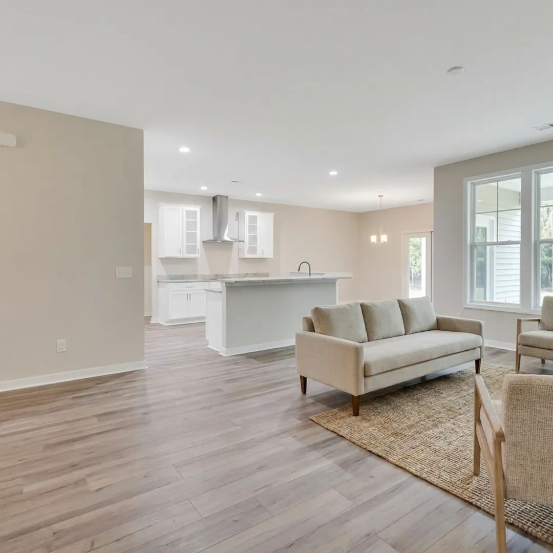 Open-concept Gwinnett Plan kitchen and living area