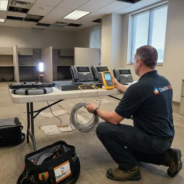 Technician testing office network relocation