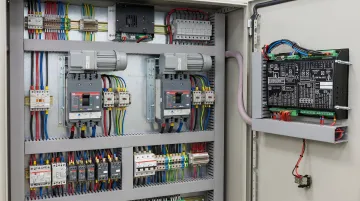 Motorized circuit breaker operator and relay control panel components for automatic bus transfer