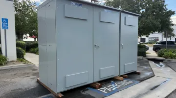 Industrial CT compartment cabinet with bar-type current transformers and hinged door