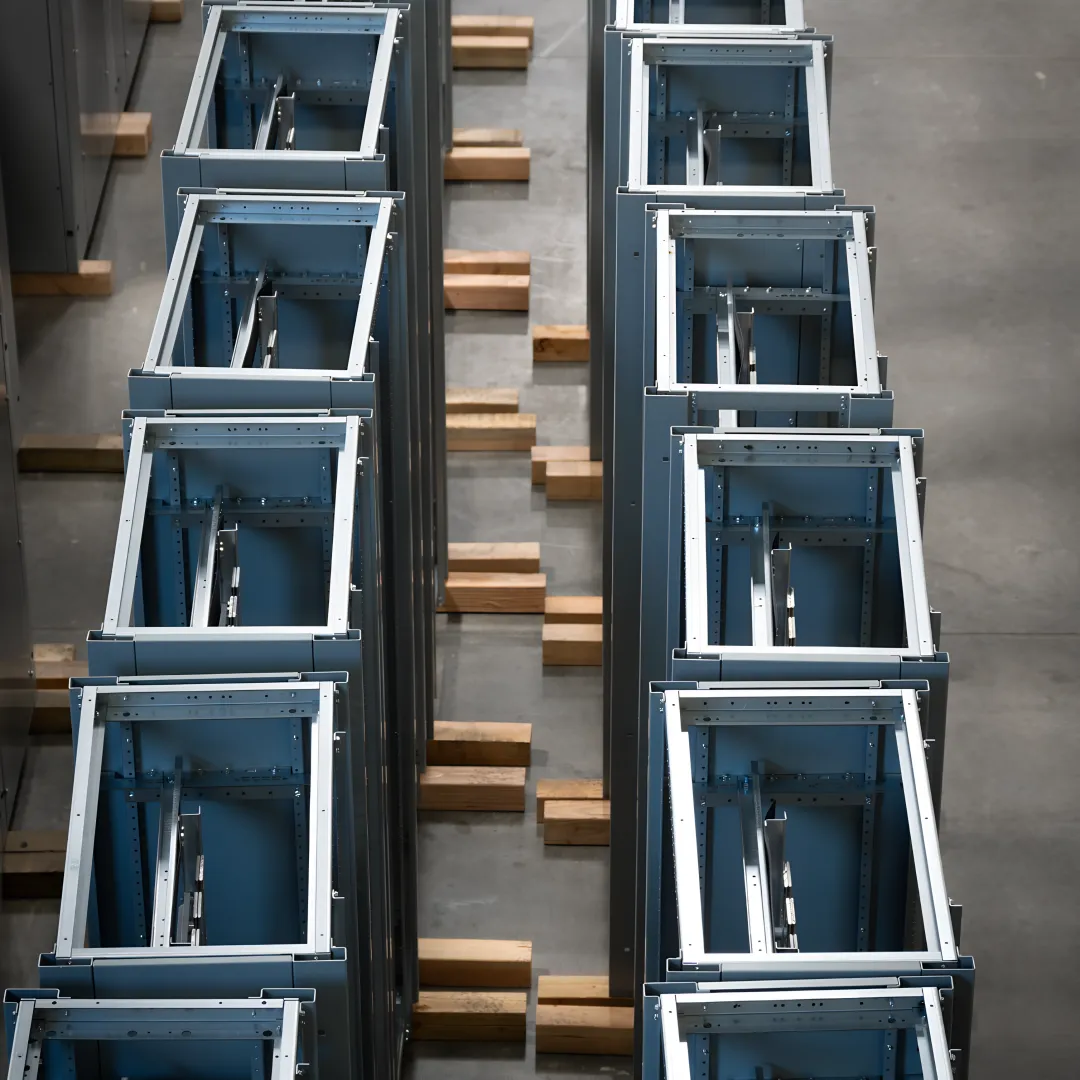 Engineers reviewing industrial switchgear design