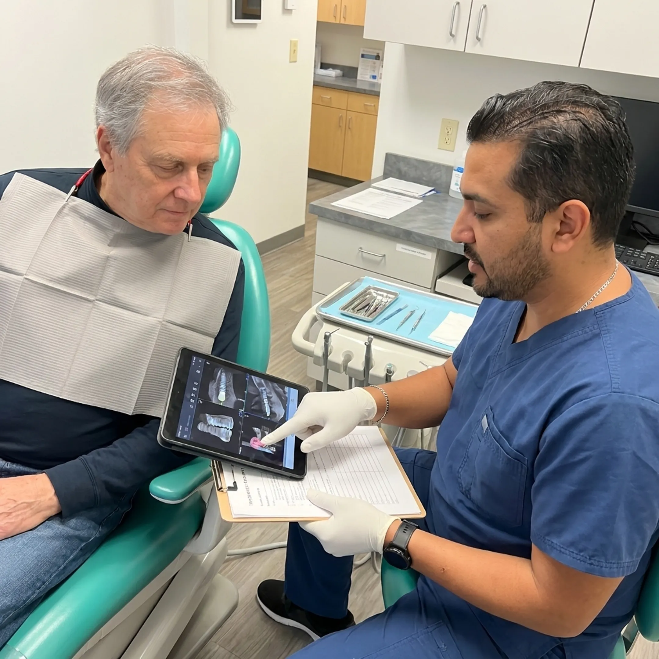 Dentist discussing a personalized implant plan