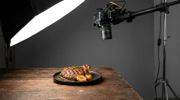 Professional food photography studio setup with hero product shot and lighting equipment