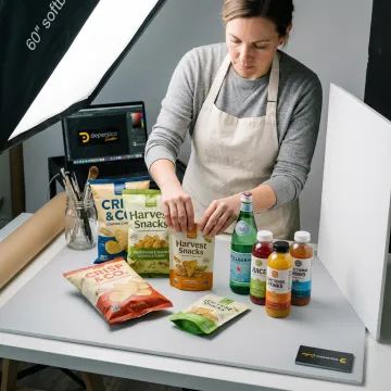 Food stylist preparing a CPG product photoshoot