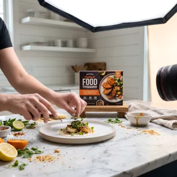 Food styling process in professional studio kitchen