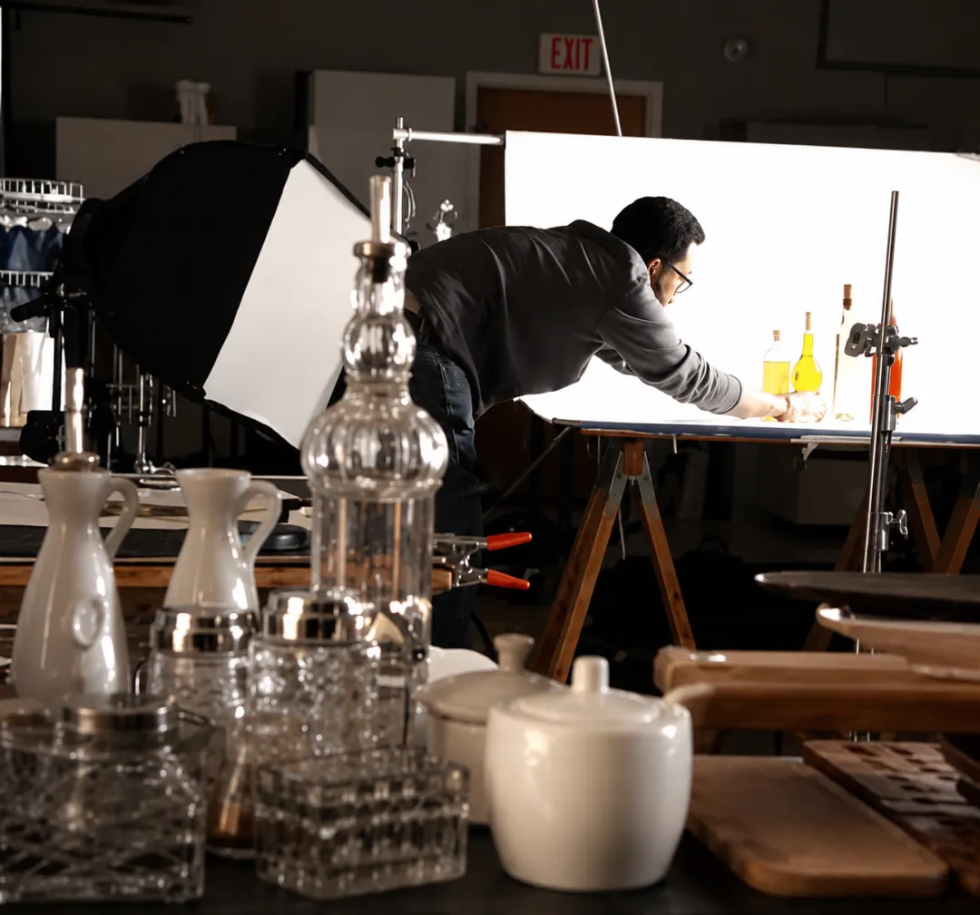 Food styling process in professional studio kitchen
