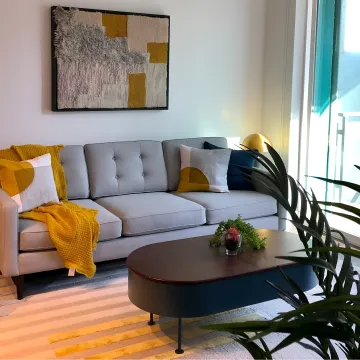 Interior design team coordinating furniture delivery and installation