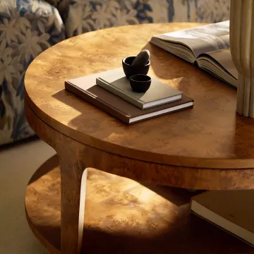 Interior designers installing furniture and styling a finished room