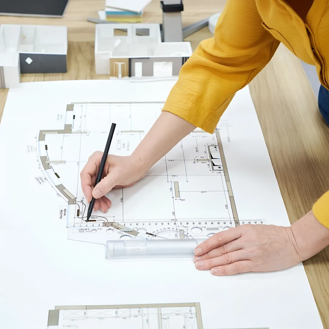 Designer reviewing luxury interior plans and samples