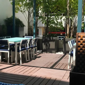 Elegant commercial restaurant interior with custom furniture and warm lighting