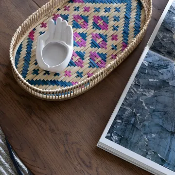 Interior designer reviewing plans and material samples