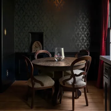 Restaurant designer reviewing plans and finishes