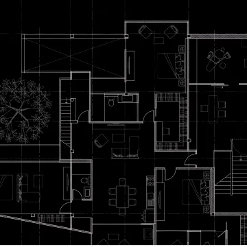 Designer reviewing interior floor plans and renderings
