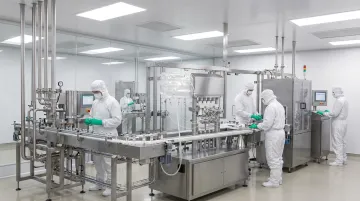 Pharmaceutical sterile fill line with stainless steel equipment and cleanroom sealing components